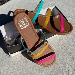 Cute sandals with three straps. Brand new never worn.